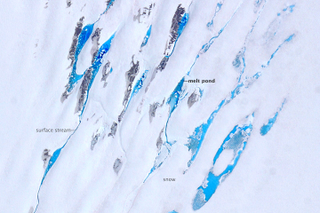 Illustration for article titled Melt Ponds on Ice Sheets Are Chillingly Beautiful